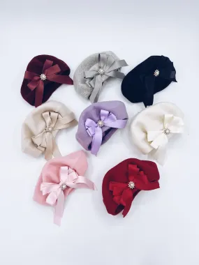 Classic Kids wool beret with beautiful bow details.